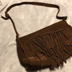 Brown leather purse with tassels